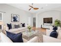 Elegant living room featuring neutral tones, stylish furniture, and ample natural light, perfect for relaxation at 2267 Yalta Ter, North Port, FL 34286