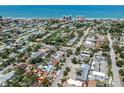 Aerial view of a neighborhood close to the beach; property is outlined in red for clarity at 409 Armada S Rd, Venice, FL 34285