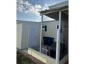 Enclosed patio with access to a utility shed and ample storage space at 417 Via Veneto, Venice, FL 34285