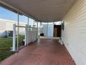 Spacious covered patio with an open view, perfect for outdoor enjoyment and relaxation at 417 Via Veneto, Venice, FL 34285