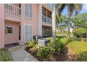 Exterior of the property featuring well-manicured landscaping and a view of the surrounding neighborhood at 458 Cerromar Rd # 382, Venice, FL 34293