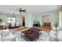 Open concept living area seamlessly connecting the living room and dining space at 18375 Lamont Ave, Port Charlotte, FL 33948