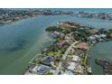 Wide aerial view of waterfront home, highlighting the coastal community at 333 Sunrise Dr, Nokomis, FL 34275