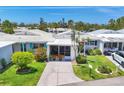 Charming single Gathering home with beautiful landscaping, well manicured yard, and lovely curb appeal at 608 Fair Winds Dr # 608, Nokomis, FL 34275