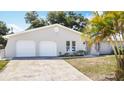 Charming single-Gathering home with a well-manicured lawn and a two-car garage at 7140 Teaberry St, Englewood, FL 34224
