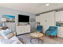 Inviting living area with plush seating, modern furnishings, and ample space for relaxation and entertainment at 1555 Tarpon Center Dr # G 235, Venice, FL 34285
