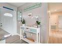 Stylish entryway with elegant decor and modern accents at 7505 Wexford St, North Port, FL 34287