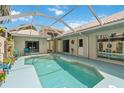Inviting pool area with a screen enclosure, perfect for relaxation and outdoor enjoyment at 1110 Southlake Ct, Venice, FL 34285