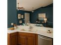 Modern kitchen featuring stainless steel appliances, ample countertop space and plenty of room at 3601 Point St, North Port, FL 34286