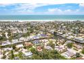 Beautiful aerial view of coastal neighborhood with waterfront homes and canal access to the Gulf of Mexico at 5369 Shadow Lawn Dr, Sarasota, FL 34242