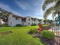 A well maintained condo with lush landscaping and close access to the community pool at 800 Capri Isles Blvd # 235, Venice, FL 34292