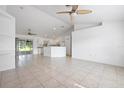 Spacious living area with open-concept design and a seamless flow into the kitchen, perfect for modern living at 2397 Morton Rd, North Port, FL 34291