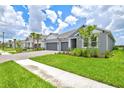 Beautiful view of the well-manicured lawn, with sidewalks, in a neighborhood at 1607 Laurel Brook Ln, Port Charlotte, FL 33953