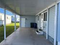 Spacious carport attached to the home, offering ample parking and protection from the elements at 529 Cervina S Dr, Venice, FL 34285