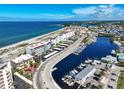 An aerial view showing the condos proximity to the beach and the inter-coastal waterway at 950 Tarpon Center Dr # 305, Venice, FL 34285