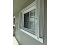 Window with accordion shutters at 3310 Loveland Blvd # 1406, Punta Gorda, FL 33980