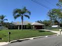 Single story home with mature landscaping at 4023 Platt St, North Port, FL 34286