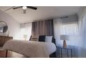 Spacious bedroom with hardwood floors, neutral color palette, and ample window light at 922 E Ida St, Tampa, FL 33603