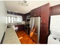 Modern kitchen with stainless steel appliances and granite countertops at 2424 W Tampa Bay Blvd # H103, Tampa, FL 33607