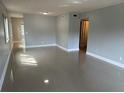 Spacious living room with tile floors at 2386 Sumatran Way # 26, Clearwater, FL 33763