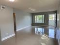 Bright living room with tile floors at 2386 Sumatran Way # 26, Clearwater, FL 33763