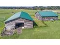 Aerial view of barn and surrounding pastures at 37600 Largo Ln, Dade City, FL 33523