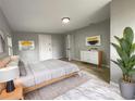 Bright main bedroom with new flooring, neutral paint and a stylish modern design at 4011 Mesa Ave, Sarasota, FL 34233