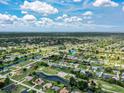 Property view showcasing location near golf course and waterway at 287 Mariner Ln, Rotonda West, FL 33947