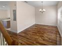 Dining room with hardwood floors and a chandelier at 8882 Christie Dr, Largo, FL 33771