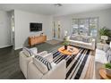 Bright living room with modern furnishings and a stylish black-and-white rug at 548 47Th N Ave, St Petersburg, FL 33703