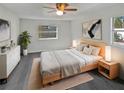 Stylish main bedroom featuring a comfortable bed, modern decor, and ample natural light at 548 47Th N Ave, St Petersburg, FL 33703