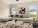 Living room with light neutral decor, comfortable seating, and large windows at 11334 Hudson Hills Ln, Riverview, FL 33579