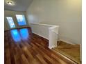 View of stairs leading up from a loft area in living room at 10412 Villa View Cir # 10412, Tampa, FL 33647