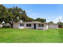 Cute ranch style home with a large yard at 580 Leach St, Englewood, FL 34223