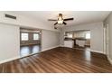 Open living room and kitchen with modern flooring at 580 Leach St, Englewood, FL 34223