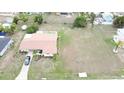 Aerial view of property showing home and large lot at 156 Francis Ne Dr, Port Charlotte, FL 33952