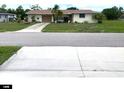 Ranch-style home with attached two-car garage at 156 Francis Ne Dr, Port Charlotte, FL 33952