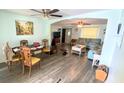 Living room with laminate flooring and open layout at 156 Francis Ne Dr, Port Charlotte, FL 33952