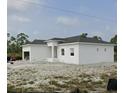 Newly constructed home with a clean, modern design at 13 Polar Ct, Placida, FL 33946