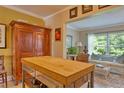 Open living area with a view to the kitchen and access to the outside at 2340 Grecian Way # 46, Clearwater, FL 33763