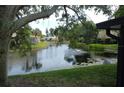 Peaceful view of a canal with lush greenery at 3601 57Th Avenue W Dr # 31, Bradenton, FL 34210