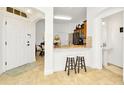 Kitchen with breakfast bar, stainless steel appliances, and light flooring at 2111 Tetley Ct, Brandon, FL 33510