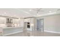 Open-concept kitchen boasts recessed lighting, stainless steel appliances, and seamless flow to living spaces at 4990 Fairhope Cir, Lakewood Ranch, FL 34211