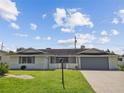 Front view of a newly remodeled house at 716 Fox Hills Dr, Sun City Center, FL 33573