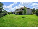 Spacious backyard with large patio and privacy fence at 291 Mossy River Ct, Brandon, FL 33511