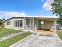 Charming single story home with carport and screened porch at 22230 Augusta Ave, Port Charlotte, FL 33952