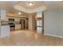 Updated kitchen with stainless steel appliances and granite countertops at 3720 Orangepointe Rd, Valrico, FL 33596