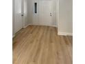 Light and bright entryway with new flooring at 2062 Cottondale Ave, Spring Hill, FL 34608