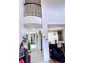Bright and spacious entryway with high ceilings and open floor plan at 8231 Dunham Station Dr, Tampa, FL 33647