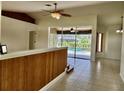 Spacious living room with view of the pool at 1847 Wheeling Ave, North Port, FL 34288